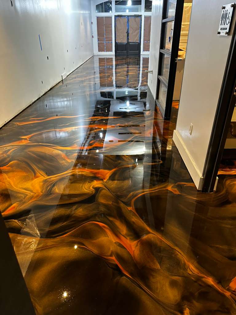 Finished metallic floor